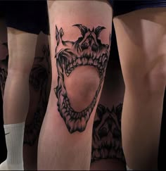 a group of people with tattoos on their legs