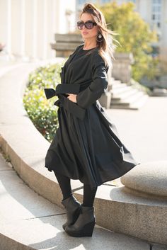 Autumn Winter Black Long Loose Fit Dress with belt. Made of cold wool Suitable for maxi sizes. The model wears size M - 5′6″ / 170 cm. Black Long Sleeve Belted Dress For Spring, Winter Workwear Dress With Belt, Fall Midi-length Belted Dress, Chic Fall Maxi Dress With Belted Cuffs, Black Belted Dresses For Fall, Black Midi-length Belted Dress For Spring, Black Midi Length Belted Dress For Spring, Winter Evening Dresses With Belt, Black Belted Midi Dress For Spring