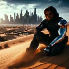 a man sitting on top of a sandy dune