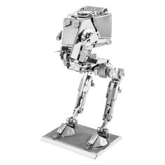 "Smaller than the AT-AT, the AT-ST from Star Wars is just as capable. Create one with this Fascinations kit.  Amazingly detailed etched model is fun & satisfying to assemble Each model starts out as 4-inch square metal sheets & you simply pop out the pieces & follow the included directions to assemble your model  Includes: 2 metal sheets Assembled size: 3.5\" x 2\" x 1.75\" Age: 14 years & up Imported Model number: FSMMS261  Size: One Size. Color: Multi/None. Gender: male. Age Group: kids." Metal Earth Models, Earth 3d, Metal Model Kits, At At Walker, Star Wars Models, Man Crafts, Metal Earth, 3d Metal, Metal Models