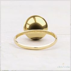 DetailsMade to orderMaterial: 14k/18k goldColor Options: Yellow Gold, White Gold, Rose GoldThe Ring Details★ Ball Diameter: 12 mm★ Band Width: 2 mm Gold Emerald Ring With Halo Design, Gold Dome Cabochon Ring In 14k Gold, Gold Signet Ring With Prong Setting, Concave 14k Gold Ring Gift, Yellow Gold Round Signet Ring With Prong Setting, Yellow Gold Domed Rings With Bezel Setting, 14k Gold Cabochon Dome Ring For Anniversary, 14k Gold Round Halo Ring, 14k Gold Cluster Ring With Bezel Setting