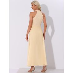 The sleeveless jumpsuit features a stylish halter neck and a belted waist, creating a flattering silhouette that is perfect for weddings, cocktail parties, and other dressy occasions. A must-have option for the new season, adding new styles to your wardrobe. The sleeveless design and lightweight fabric ensure you stay cool and comfortable, even on the hottest days. Whether you pair it with heels and statement jewelry for an elegant evening look. The model is on the taller side, and therefore, se Sleeveless Beige Maxi Dress For Wedding, Sleeveless Bridesmaid Maxi Dress, Sleeveless Solid Color Bridesmaid Maxi Dress, Fitted Sleeveless Maxi Dress For Bridesmaid, Sleeveless Solid Color Maxi Dress For Bridesmaids, Sleeveless Maxi Dress For Wedding Guest, Fitted Sleeveless Dress For Wedding Guest, Solid Sleeveless Maxi Dress For Wedding, Fitted Sleeveless Maxi Dress For Wedding Guest