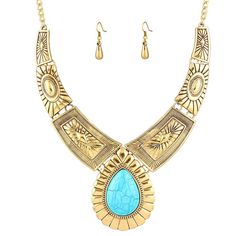 Turquoise Blue Stone Antique Gold Ornate Necklace & Earring SetItem: Necklace & Earring SetColor: Antique Gold, BlueMaterials: Faux Turquoise, ResinMetal: AlloyTheme: Boho, TribalNecklace Length: 18.11" with 2.36" extension.Clasp: Lobster clasp closure,Turquoise Pendant (center) : 2 1/2" * 2"Weight: 82 gramsEarring Length: 0.98” Find your inner Cleopatra with this gorgeous turquoise necklace and earrings set!This Necklace consists of graduating Gold Connectors embossed with tribal Designs and th Ornate Necklace, Turquoise Pattern, Collar Chain, Stone Choker, Turquoise Pendant, Necklace Earring Set, Blue Stone, Chain Pendants, Turquoise Jewelry