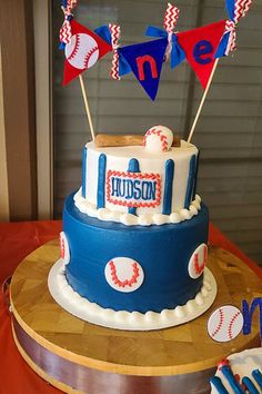 a baseball themed birthday cake on a table