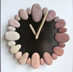 there is a clock made out of rocks