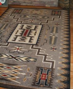 an area rug on the floor in a living room