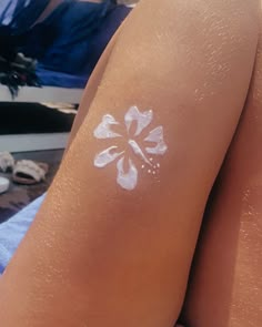 a person with white paint on their legs