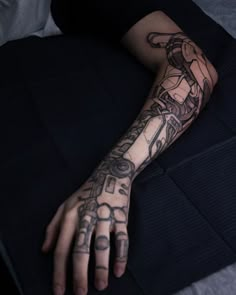 a person with a tattoo on their arm