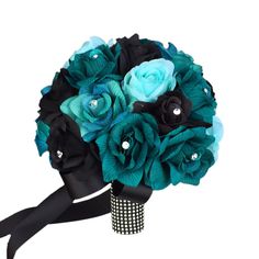 a bridal bouquet with blue and black flowers