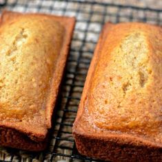 two loafs of banana bread cooling on a wire rack