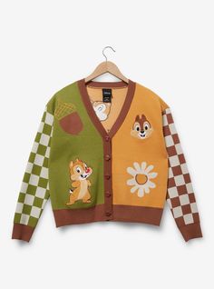 You'll be the cutest critter around in this cardigan! Cozy fabric features embroidered patches of Chip & Dale  backed by checkered sleeves and knit designs. With acorn-shaped buttons  this cropped outerwear is perfect for a day in the woods.A BoxLunch Exclusive!50% recycled polyester; 28% polyester; 22% viscoseListed in women's sizes; unisex silhouetteWash cold with like colors; dry lowImported Powerline Disneybound, Stitch Halloween Costume, Disney Chip, Plus Size Cropped, 2024 Wishlist, Crop Cardigan, Chip And Dale, Disney Sweatshirts, Big And Tall Outfits