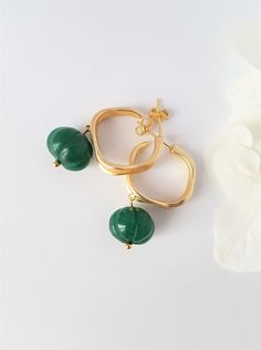 Gold Pearl Summer Earrings, Carved stone and Gold Pleated Hoops, Modern simple design, Gift for her, Bridesmaids earrings Beautiful earrings that just look like summer.  These earrings measure about 3,5 cm the top of the ear posts to the end. The width is about 1cm.  They are made with Gold plated Hoops, Carved green Onyx gemstone  Please allow for slight variations as the beads are natural and each piece is handmade. Thanks! To view my other creations, please visit Etsy.littlewomenbusiness.com Jade Round Earrings For Wedding, Round Jade Earrings For Wedding, Elegant Round Jade Earrings For Weddings, Elegant Jade Hoop Earrings, Gold Jade Wedding Earrings, Modern Earrings With May Birthstone Gemstone, Modern Gold Earrings For May Birthstone, Jade Drop Earrings For Anniversary, Modern Green Earrings For Anniversary