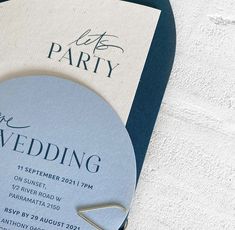 a wedding card with a paperclip attached to it