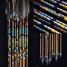 several different types of pens and pencils on display