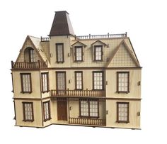 a large doll house with many windows and balconies on the second floor is shown