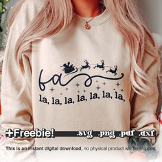 a woman with long blonde hair wearing a sweatshirt that says freebiel sleigh, put art on it