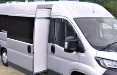 a white van parked in a parking lot