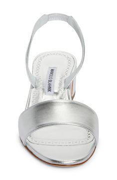 Fashioned from silver metallic leather, this modern sandal is set on a low block heel and secured with a stretchy slingback strap. 1 1/4" heel, 31mm (size 38.5) Elasticized slingback strap Leather upper, lining and sole Made in Italy Designer Shoes Silver Low Heel Slingback Sandals For Summer, Silver Slingback Sandals For Evening, Silver Slingback Sandals For Formal Summer Events, Chic Silver Ankle Strap Slingback Sandals, Silver Slingback Sandals For Summer, Silver Slingback Sandals For Summer Evenings, Silver Slingback Sandals For Spring, Silver Slingback Open Heel Sandals For Spring, Silver Slingback Sandals With Heel Strap