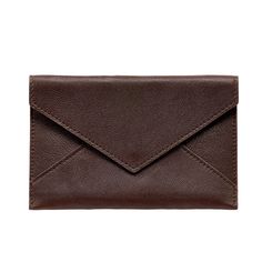 Make a statement with our medium leather envelope. A stylish and functional carrying case with a snap enclosure for papers and photos. Makes a great gift for events and getaways. Size: 7" x 4-1/2" Goatskin leather All leather outside and inside flap Inside envelope lined with suede-finish Personalization is available Envelope Card Holder With Interior Slots, Leather Envelope Card Holder, Everyday Leather Envelope Card Holder, Brown Envelope Card Holder For Everyday Use, Classic Envelope Card Holder For Daily Use, Brown Envelope Card Holder For Daily Use, Leather Envelope Card Holder For Travel, Leather Envelope Wallet With Interior Card Slots, Envelope Card Holder With Interior Slots For Travel