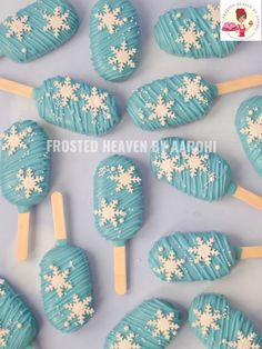 frosted heart shaped lollipops with snowflakes on them