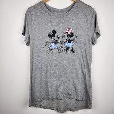 Disney's Mickey And Minnie Grace This Adorable Tee Shirt, Which Is Made Of Lightweight Fabric. It's Perfect For Warm Days At The Park! Brand New Without Tags. Never Worn. Smoke-Free Home. Disney Mickey And Minnie, Mickey And Minnie, Disney Tops, Disney Mickey, The Park, Lightweight Fabric, Tee Shirt, Graphic Tee, Tee Shirts