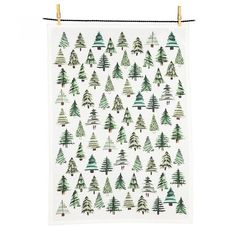 a tea towel with trees printed on it