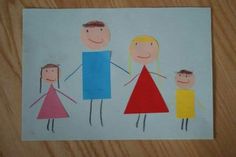 a drawing of three people holding hands and standing next to each other on a piece of paper