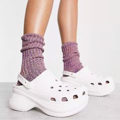 Brand New, Just Purchased From Stockx But Unfortunately Are Too Large For Me. Please Check Your Crocs Sizing As There Are No Returns. Women's Crocs Classic Bae Clog The Classic Clog Has Been Reimagined With An Extra Dose Of Height, Attitude, And Style. Introducing The Crocs Classic Bae, Featuring An Ultra-Contoured Outsole That Supports The Upper You Know And Love But There’s More. The New Customizable Backstrap Also Holds Jibbitz Charms, So You Can Personalize Your Look Even More. When You’re F Crocs Bae Clogs, Bae Clogs, Crocs Platforms, Crocs Bae, Bae Clog, Croc Outfits, Crocs Logo, Crocs Platform, Platform Crocs