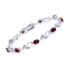 PRICES MAY VARY. Exquisite Gemstones: Adorn your wrist with the brilliance of red Rhodolite Garnet gemstones. The oval 6x4mm stones are carefully selected for their deep red hue and impeccable clarity. Diamond Accents: The Greek Vine Tennis Bracelet features dazzling diamond accents, adding a touch of elegance and luxury to your ensemble. The diamonds complement the rich red garnets beautifully. High-Quality Materials: Crafted from genuine 925 Sterling Silver, this bracelet combines timeless des Garnet Bracelet, Rhodolite Garnet, Fine Jewelry Bracelets, Garnet Gemstone, Bracelet For Women, Red Garnet, Tennis Bracelet, Bracelet Designs, Solid 925 Sterling Silver