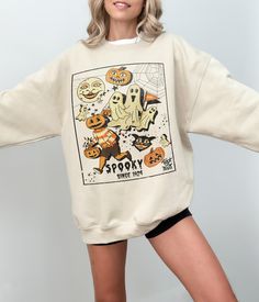 Vintage 90s Spooky Halloween Sweatshirt, Retro Halloween Sweater, Horror Season Crewneck, Pumpkin Shirt, Cat Halloween Lover Costume For Her Ideal for any situation, a unisex heavy blend crewneck sweatshirt is pure comfort. These garments are made from polyester and cotton. This combination helps designs come out looking fresh and beautiful. The collar is ribbed knit, so it retains its shape even after washing. There are no itchy side seams on these sweaters. ---------------------- FEATURES (Swe Vintage Halloween Sweatshirt For Streetwear, Vintage Halloween Long Sleeve Sweatshirt, Vintage Long Sleeve Halloween Sweatshirt, 90s Crew Neck Halloween Tops, Vintage Crew Neck Halloween Tops, Vintage Crew Neck Tops For Halloween, Retro Halloween Streetwear Tops, Retro Long Sleeve Halloween Tops, 90s Style Halloween Tops With Screen Print