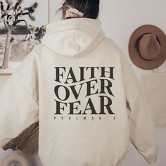 Christian Hoodie, Christian Sweatshirt, Christian Apparel for Women, Aesthetic Oversized Hoodie, Preppy Hoodie, Hoodie with Words on Back  Be fashionably bold with the 'Faith Over Fear' sleeveless hoodie! A great way to share your belief in the almighty Jesus, this comfy cotton blend hoodie is perfect for a quick trip to the gym or a day at school.   Sizing  Runs true to Size refer to size chart To get the oversized look please size up 1-2 sizes Hoodies Aesthetic Christian, Elevated Faith Hoodie, Girls Modest Fashion, God Heals Hoodie, Faith Over Fear Hoodie, Bible Hoodies, Oversized Christian Hoodie, Men’s Christian Hoodies, Positive Hoodie