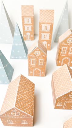 paper houses are arranged in the shape of small houses