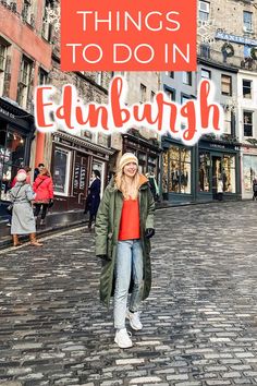 a woman standing on a cobblestone street with the words things to do in edinburgh