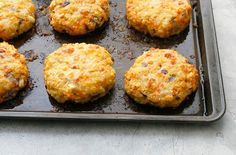 some food is sitting on a baking tray and ready to be cooked in the oven