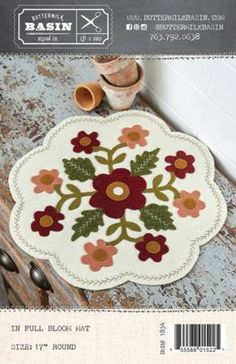 an image of a rug with flowers on it