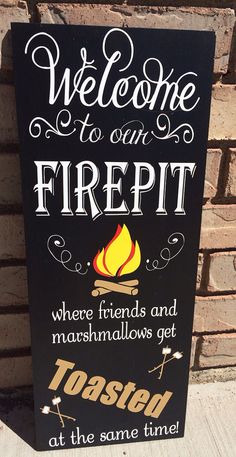 a sign that says, welcome to our firepit where friends and marshmallows get toasted at the same time