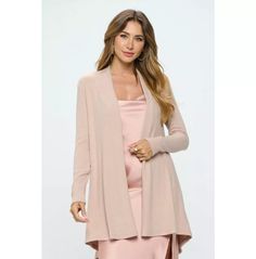 Elevate your wardrobe with our Women's Brushed Knit Cardigan, designed for versatility and comfort. This stylish cardigan features a draped front that gracefully covers the hips, making it an ideal choice for casual outings, work environments, or formal occasions. Crafted from a soft blend of 97% Rayon and 3% Spandex, it offers a luxurious cashmere-like feel against the skin. Available in multiple colors, this cardigan seamlessly blends style and functionality, ensuring you look chic no matter the occasion. Womens Boho Dresses, Harajuku Women, Shirt Blouses Women's, Work Formal, Cardigan Sweaters For Women, Women Hoodies Sweatshirts, Women Shirts Blouse, Casual Work, Boho Women