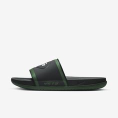 Cheer your team to victory in comfort with the Nike Offcourt (NFL New York Jets) Slide. A cushy synthetic leather strap features your team’s logo, while an innovative foam midsole makes this slide so comfy, you’ll never want to take it off. Nike Sporty Slip-resistant Slides, Green Synthetic Slides For Sports, Green Sporty Synthetic Slides, Sporty Green Synthetic Slides, Sporty Fade-resistant Slides For Streetwear, Nike Leather Slides With Cushioned Footbed, Black Sports Slides, Green Sporty Slides For Sports, Nike Slides With Cushioned Footbed For Sports