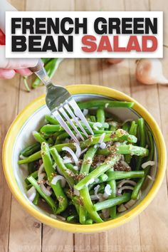 french green bean salad in a yellow bowl with the title overlay reads, french green bean salad