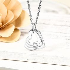 Carry those special names right on your heart! The Hollow Heart Sterling Silver Necklace features a hollowed out heart dangling on a silver chain with your choice of three engraved names. This is such a touching custom made gift to give the one you love. This woman's personalized necklace is made with sterling silver that will never fade, rust, tarnish, corrode or cause allergy. Grab this as a gift for your girlfriend, mother, wife, or any special woman in your life. Wear this everyday or send i Mom Gifts Jewelry, Personalized Charm Necklace, Engraved Pendant, Family Necklace, Friendship Necklaces, Mom Jewelry, Name Jewelry, Gifts For Your Girlfriend, Engraved Necklace