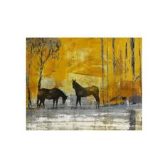 two horses are standing in the snow near some trees and yellow sky with white clouds