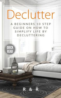 a white couch sitting on top of a wooden floor