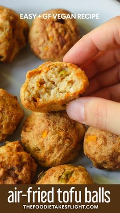 a hand is picking up an air fried tofu ball from a plate with the words easy - gf vegan recipe