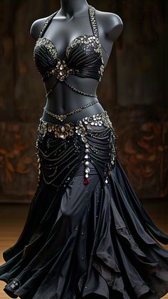 a woman in a black belly dance costume