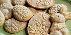 some cookies are on a green plate and ready to be eaten by someone or someone