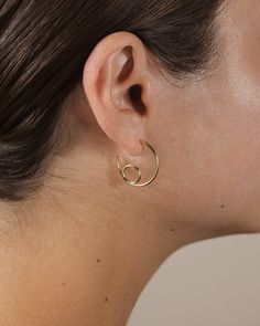 Stay in the style loop with these glam sterling silver hoops! These fun swirling earrings are unique yet versatile enough to wear anywhere. Materials: 14K gold plated sterling silver Features: 1" hoop, Lead & Nickel free, post back Modern Spiral Hoop Earrings As Gift, Modern Spiral Hoop Earrings, Gold Spiral Hoop Earrings For Everyday, Modern Spiral Hoop Earrings (single), Free Post, Sterling Silver Hoops, Silver Hoops, Gold Plated Sterling Silver, Gold And Silver