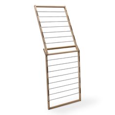 a wooden rack with metal bars on the top and bottom, against a white background