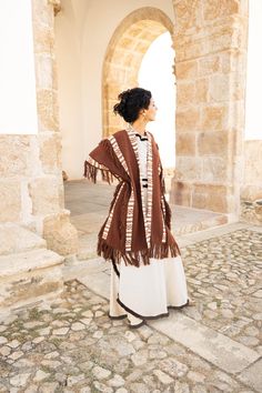 Adopt a bohemian loose-fit look with this rust-colored tribal kimono in 100% cotton. Ideal for cooler summer nights, festivals or ceremonies. Mixed model, suitable for men and women.  ༶ ༶ ༶ ༶ ༶ ༶ ༶ ༶ ༶ ༶ ༶ ༶ ༶ ༶ ༶ ༶ ༶ ༶ ༶ ༶ ༶ ༶ ༶ ༶ ༶ ༶ ༶ ༶ AVAILABILITY The kimono is available in other earthy colors :  - Brown Color : https://www.etsy.com/listing/1781191615 - Creme Color : https://www.etsy.com/listing/1766996840 ༶ ༶ ༶ ༶ ༶ ༶ ༶ ༶ ༶ ༶ ༶ ༶ ༶ ༶ ༶ ༶ ༶ ༶ ༶ ༶ ༶ ༶ ༶ ༶ ༶ ༶ ༶ ༶ MEASUREMENTS DETAILS Our prod Hippie Brown Poncho For Festivals, Oversized Bohemian Outerwear With Fringe, Bohemian Shawl Poncho For Fall, One Size Brown Fringe Poncho, Brown One Size Poncho With Fringe, Brown Fringe One Size Poncho, Bohemian Brown Cape Outerwear, Brown Bohemian Cape Outerwear, Folk Style Fall Poncho