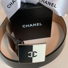 Gorgeous Chanel Black White Classic Buckle Statement Belt With Gorgeous Cc Logo Mint / Perfect Condition 10/10 Made In Italy Collection: 12c Cruise - Rare Black Patent Leather Size: 85 Cm 34 Inches Three Holes To Adjust To Various Waist Sizes Brushed Silver Hardware New! Comes Complete With Chanel Dustbag And Chanel Box Smoke Free | Pet Free Home Questions? Leave Us A Comment Below! Modern Black Belt With Silver-tone Logo Plaque, Modern Black Belts With Silver-tone Logo, Modern Black Belts With Silver-tone Logo Plaque, Elegant Black Belt With Silver-tone Logo, Designer White Leather Belts, Designer White Belt For Formal Occasions, Designer White Belts For Formal Occasion, Luxury Black Belt With Silver-tone Logo, Luxury Black Belt With Silver-tone Logo Plaque