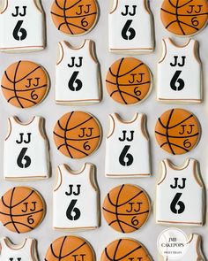 decorated cookies with basketballs and jersey on them